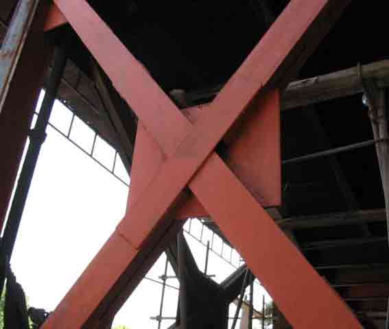 ترجمه عمران -  سیستم مهاربندی فولادی x با استفاده از فولاد کم درجه ( کم اثر) و سفت کننده های ( پشت بندهای) معکوس مورب داخلی